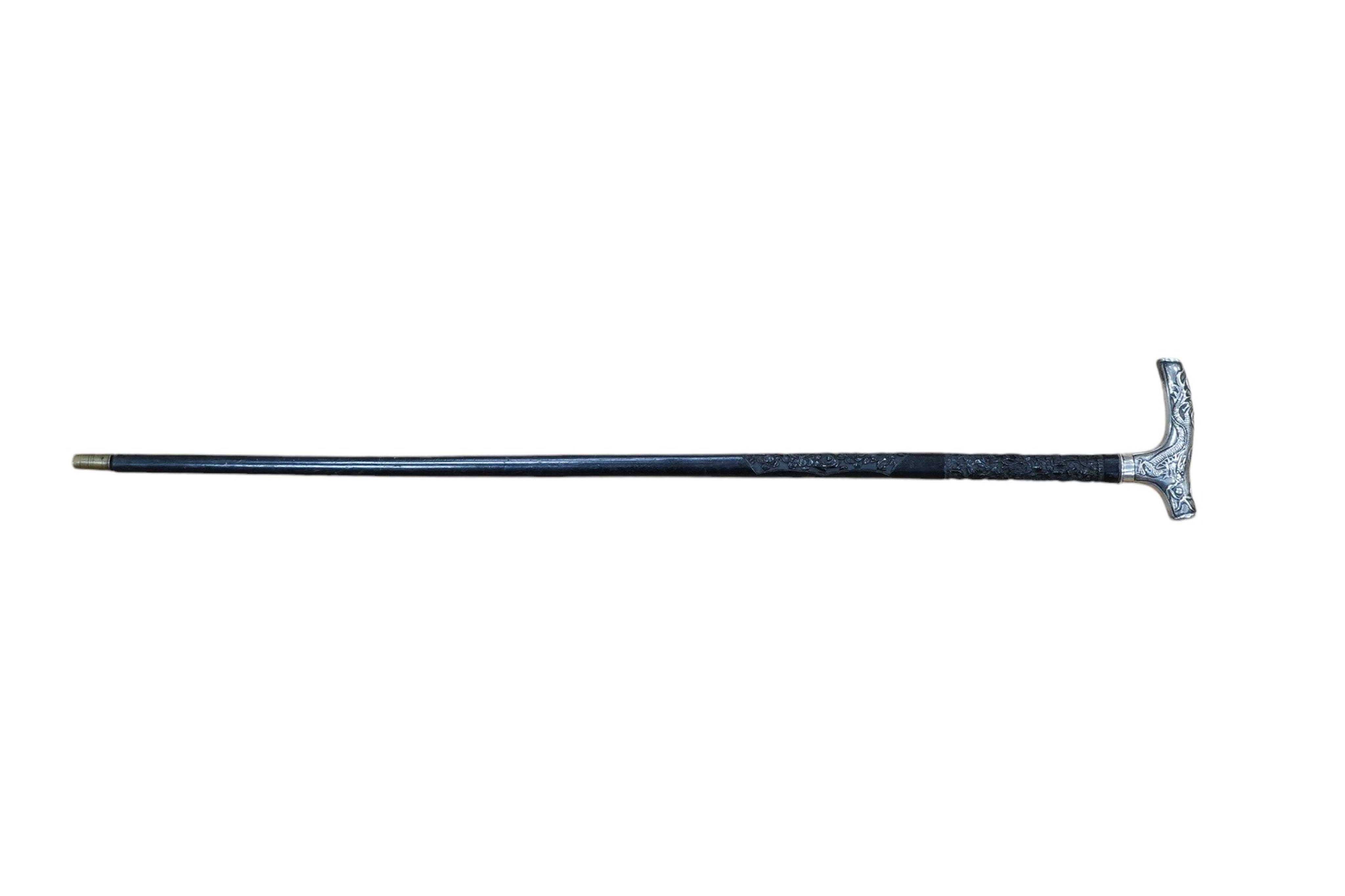 A 19th century Chinese export silver ‘dragon’ handled carved ebony walking cane, handle signed, 81cm long. Condition - fair to good